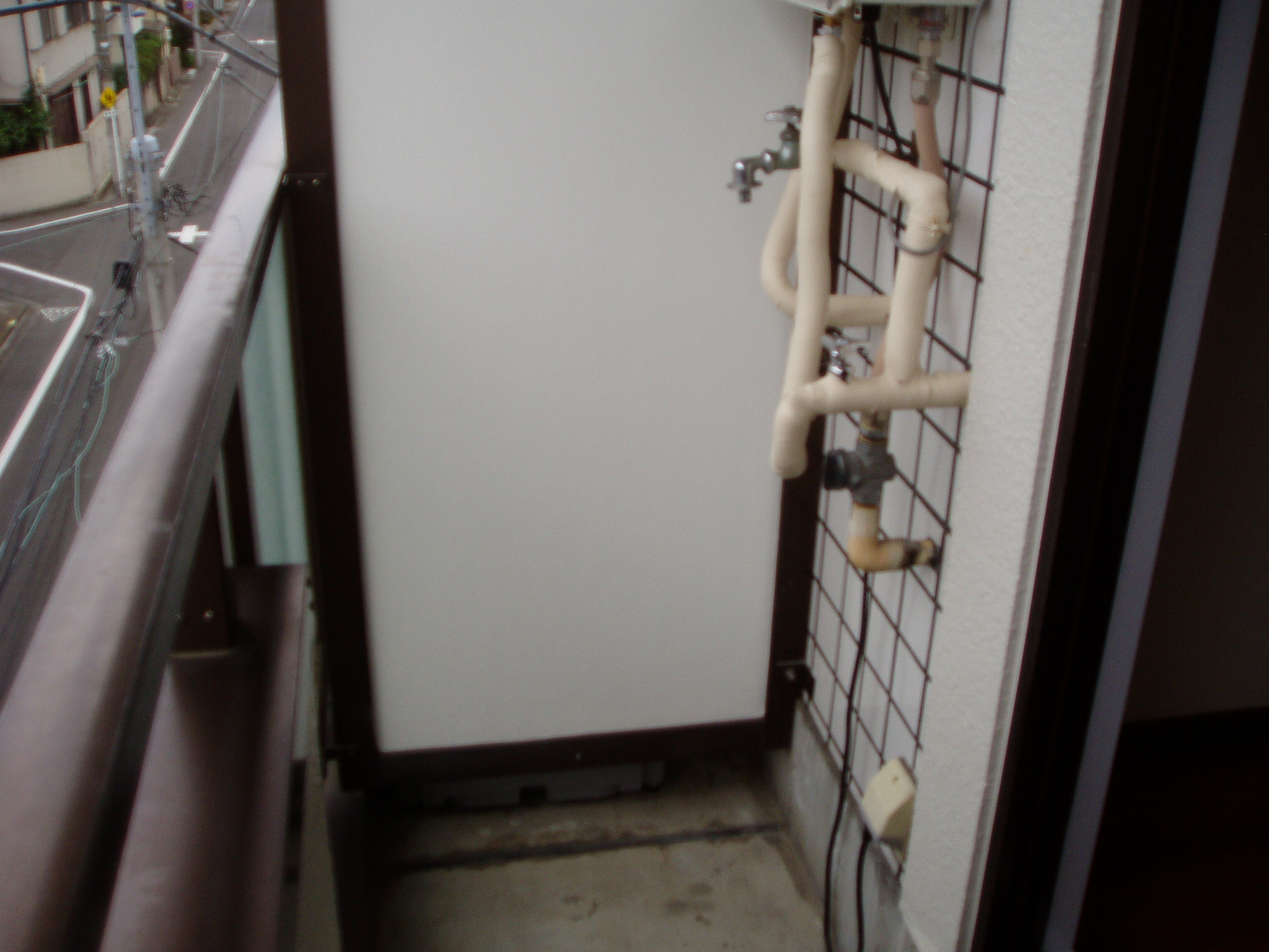 収納　ベランダ洗濯機置き場