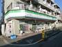 コンビニ　ファミリーマートまるいし八幡山店（コンビニ）まで153m