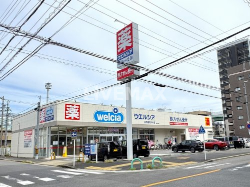 ドラックストア　ウエルシア名古屋花の木店（ドラッグストア）まで390m