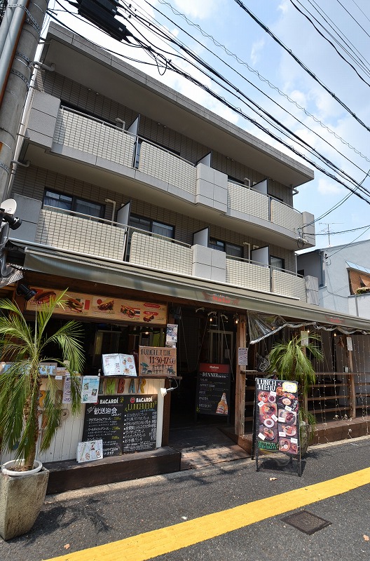 広島市西区草津新町のマンションの建物外観