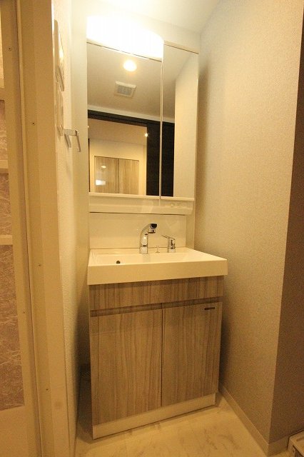 洗面設備　同物件施工業者別物件の写真