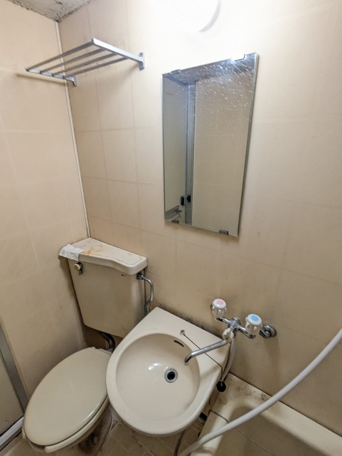 洗面設備　※クリーニング前の写真です