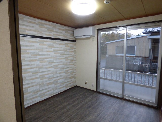 グランコムメゾン南中川の居間写真