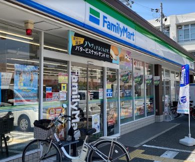 コンビニ　ファミリーマート 西成松店（コンビニ）まで245m