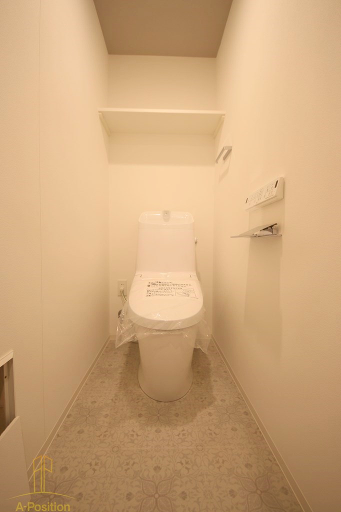レジュールアッシュ谷町四丁目グランクラスのトイレ写真