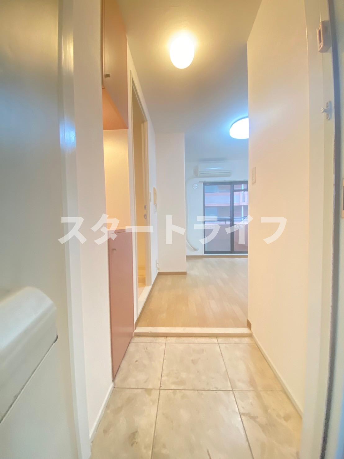 地下鉄御堂筋線 西中島南方駅 徒歩5分 5階建 築35年の玄関写真