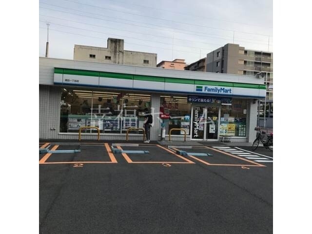 コンビニ　ファミリーマート関目一丁目店（コンビニ）まで65m