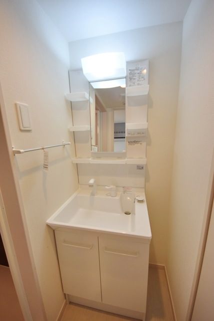 洗面設備　※同社施工同型イメージ写真