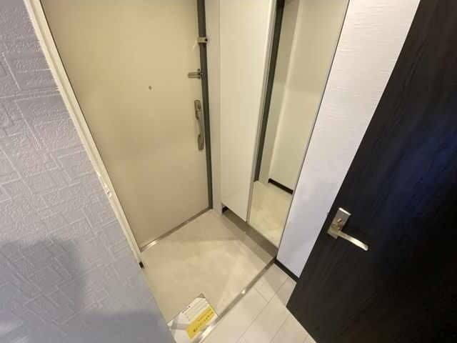 プレアデス千里山田の玄関写真
