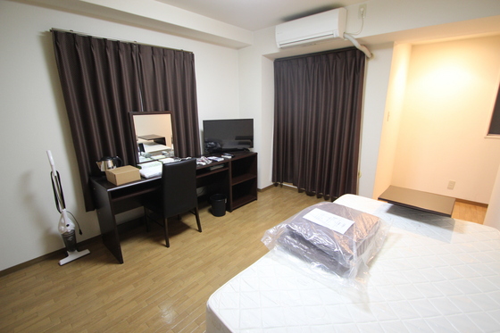 居室・リビング　※別室の写真です