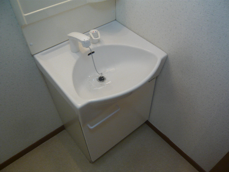 洗面設備　※画像は103号室参照です。