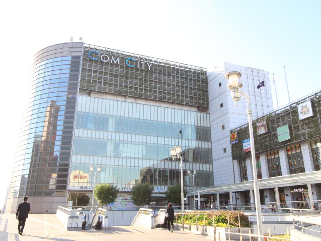 ショッピングセンター　コムシティ（ショッピングセンター）まで574m