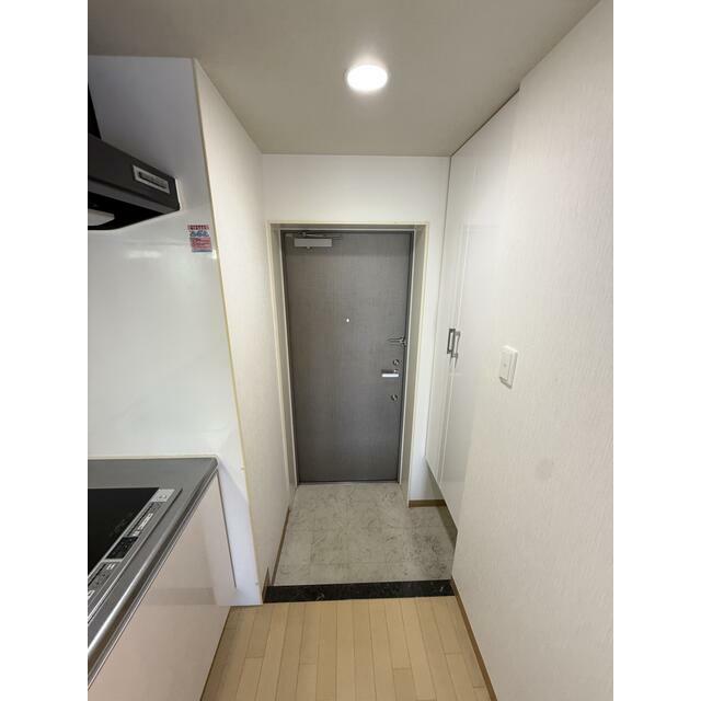 玄関　クリーニング前の写真です。