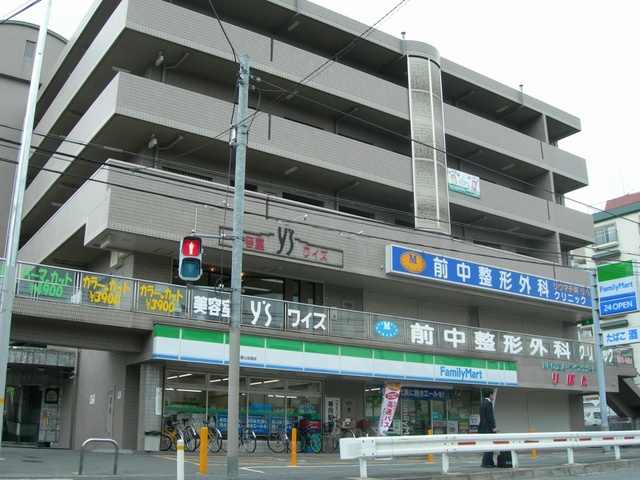 コンビニ　ファミリーマート吹田山田西店（コンビニ）まで1061m