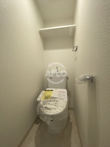 トイレ　エステムコート谷町九丁目　温水洗浄便座