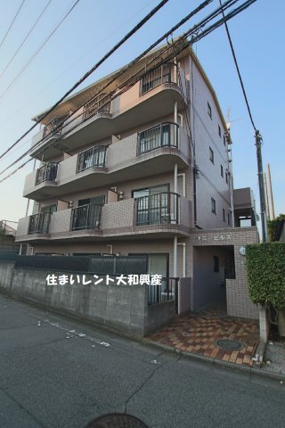 【サニーヒルズの建物外観】