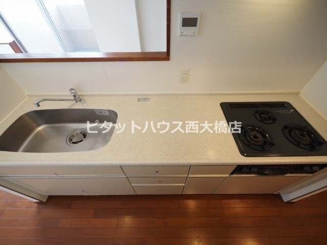 地下鉄長堀鶴見緑地線 西大橋駅 徒歩5分 25階建 築19年のキッチン写真