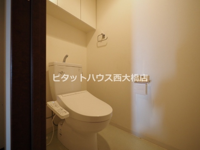 地下鉄長堀鶴見緑地線 西大橋駅 徒歩5分 25階建 築19年のトイレ写真