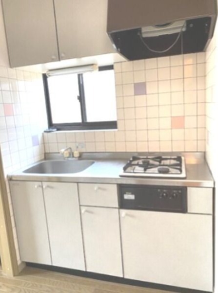 キッチン　反転間取りの別部屋の写真です。