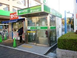 銀行　ゆうちょ銀行本店サミットストア成城店内出張所（銀行）まで810m