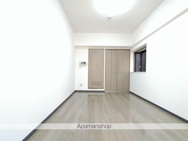 地下鉄御堂筋線 江坂駅 徒歩5分 10階建 築26年の居間写真