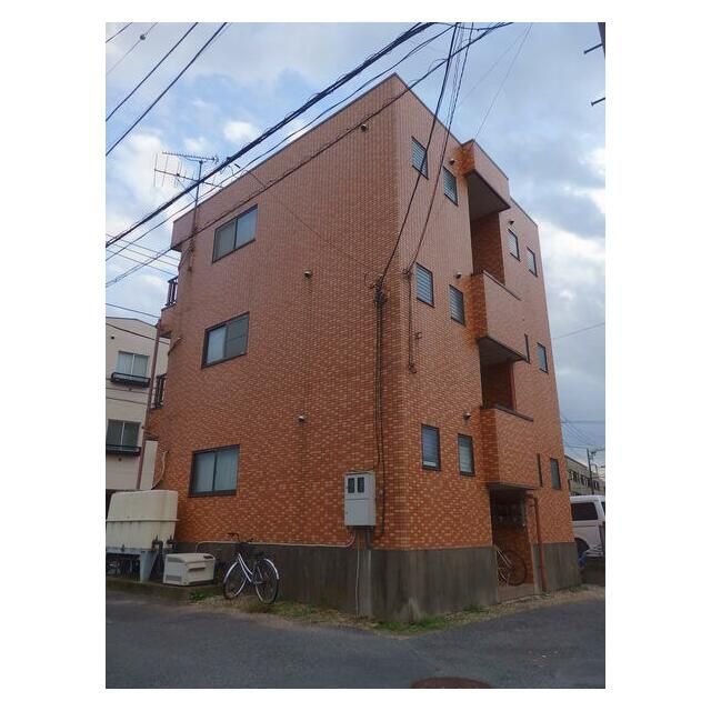 市川市関ケ島のマンションの建物外観