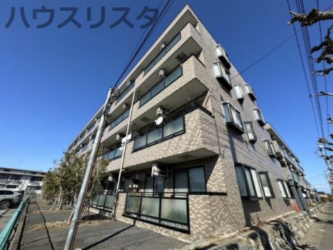 深谷市上柴町西のマンションの建物外観