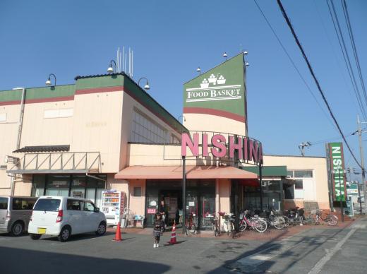 スーパー　ニシナフードバスケット西阿知店（スーパー）まで397m