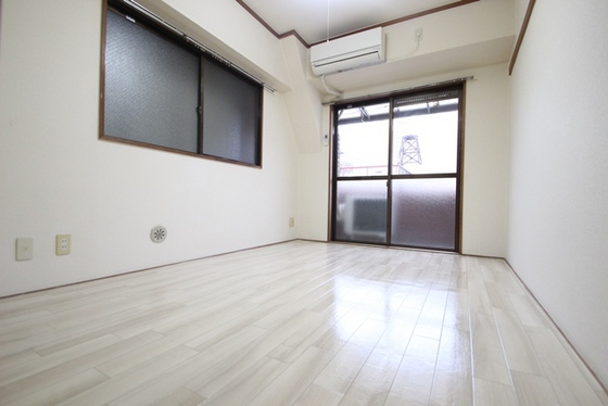 居室・リビング　※別号室のお写真です。