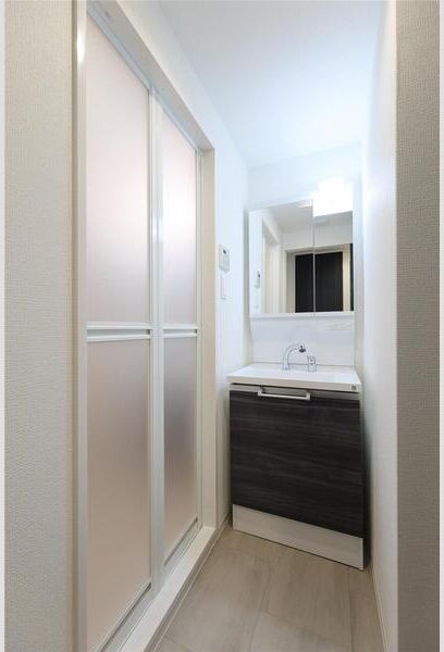 洗面設備　建築中のためモデルルームのお写真になります。