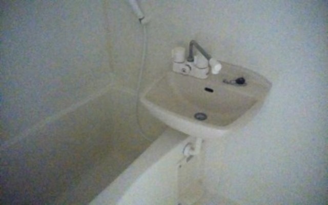 洗面設備　参考写真（同建物別部屋反転タイプ）