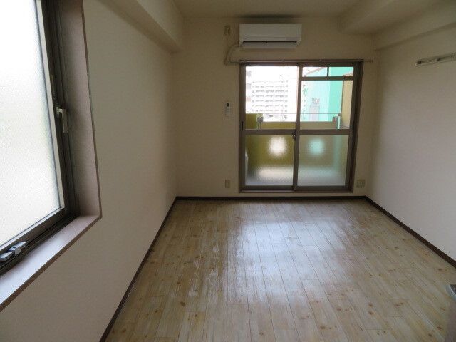 地下鉄谷町線 天神橋筋六丁目駅 徒歩2分 8階建 築24年の居間写真