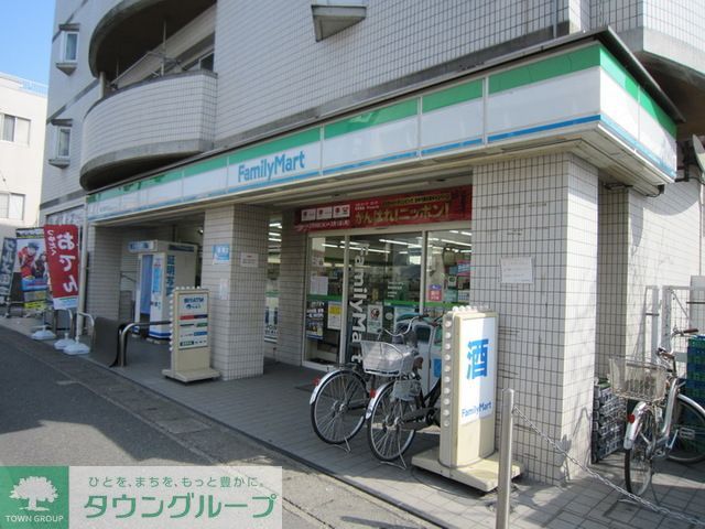 コンビニ　ファミリーマート京王稲田堤駅前店（コンビニ）まで320m