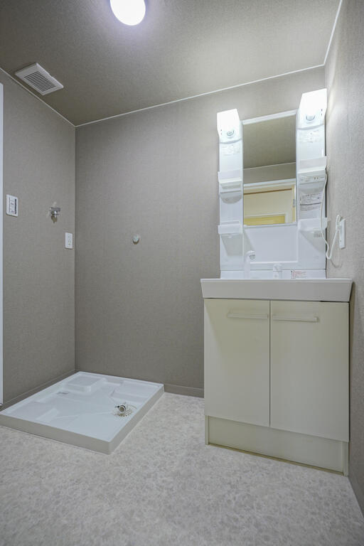 洗面設備　同マンション別部屋の写真です