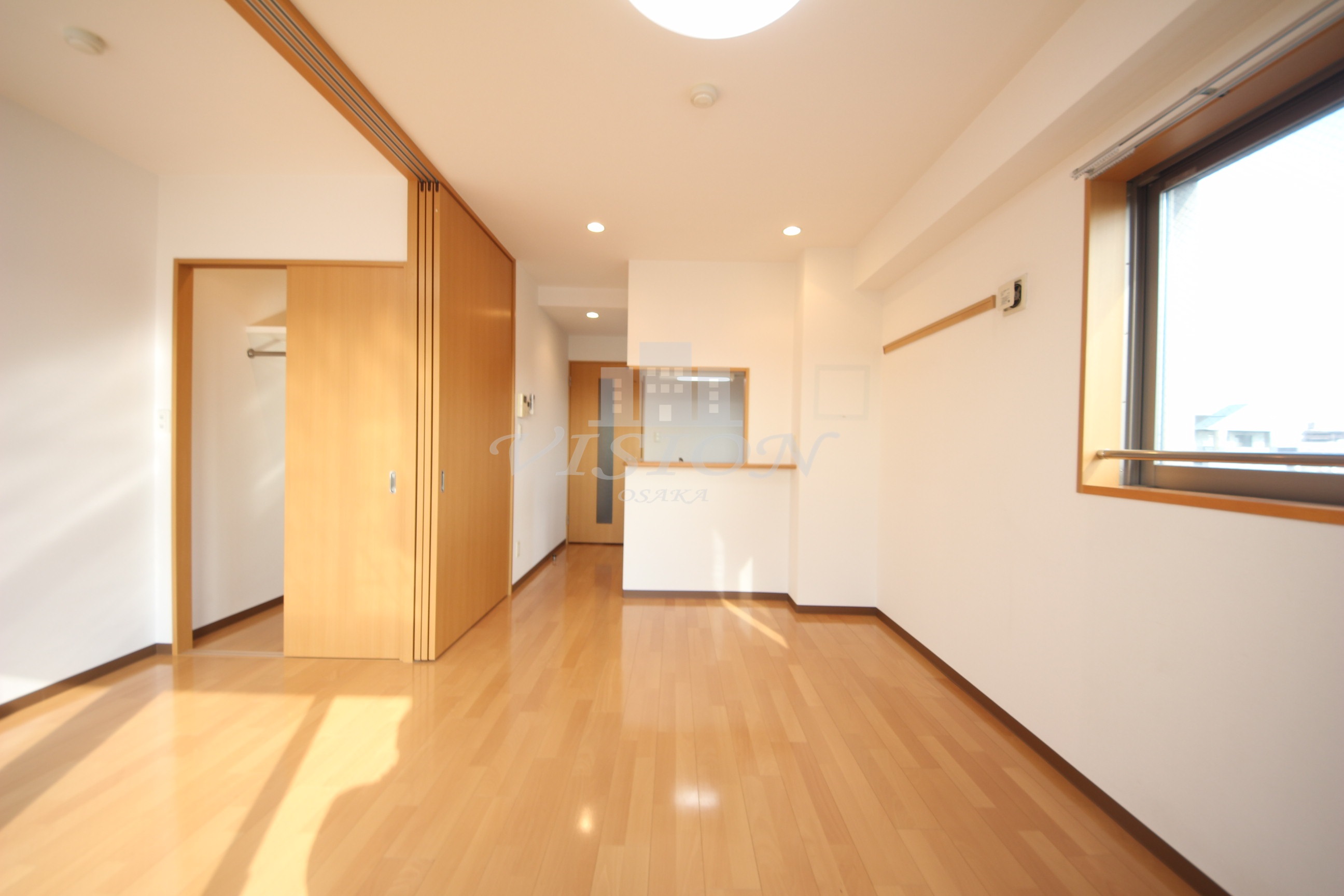 阪急千里線 吹田駅 徒歩4分 9階建 築16年の居間写真