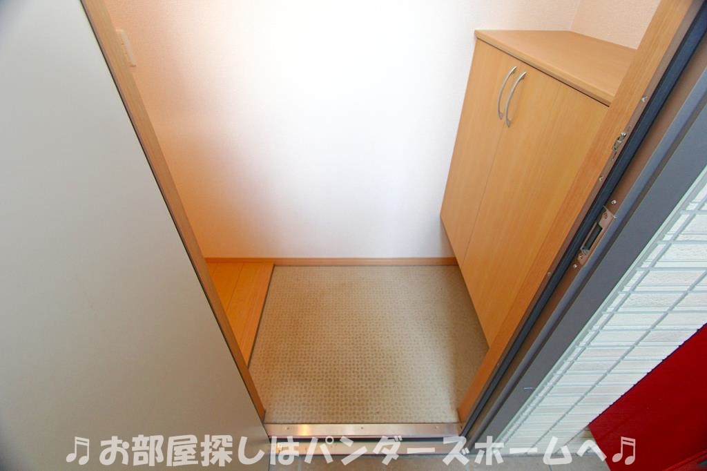 グリーンバレー香里ヶ丘A棟の玄関写真