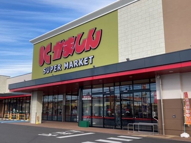 スーパー　かましん カルナ駒生店（スーパー）まで500m