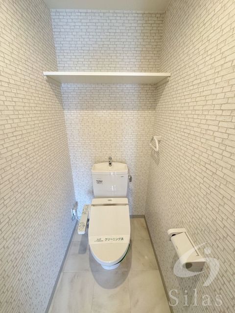 地下鉄御堂筋線 長居駅 徒歩5分 3階建 築9年のトイレ写真