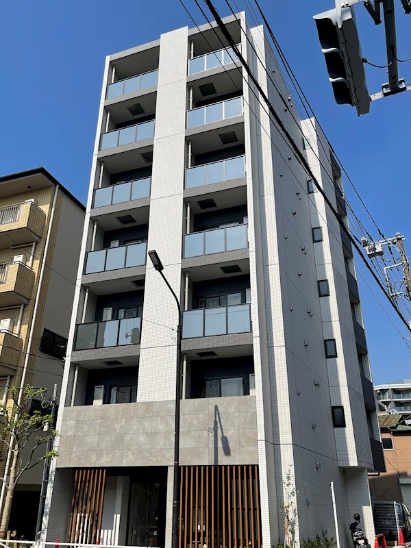 建物外観　タイル貼りの分譲賃貸