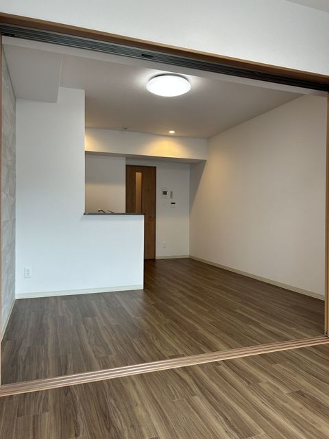 フリーダムレジデンス堺大小路の居間写真