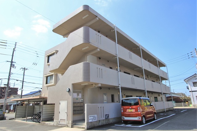 【松山市竹原のマンションの建物外観】