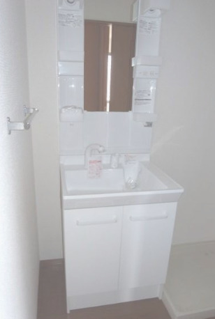 洗面設備　写真は別居室のものです。