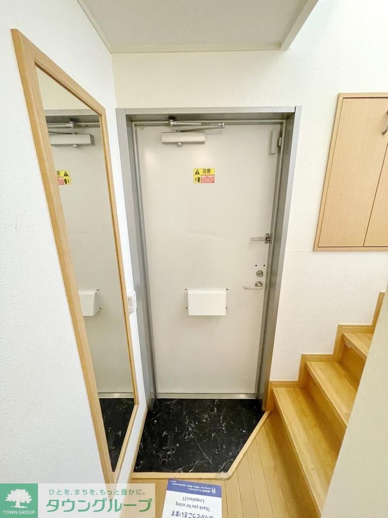 レオネクストサングリーン経堂の玄関写真