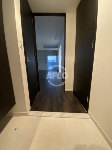 スワンズシティ谷町モデルノの玄関写真