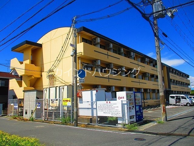 【泉佐野市南中安松のマンションの建物外観】