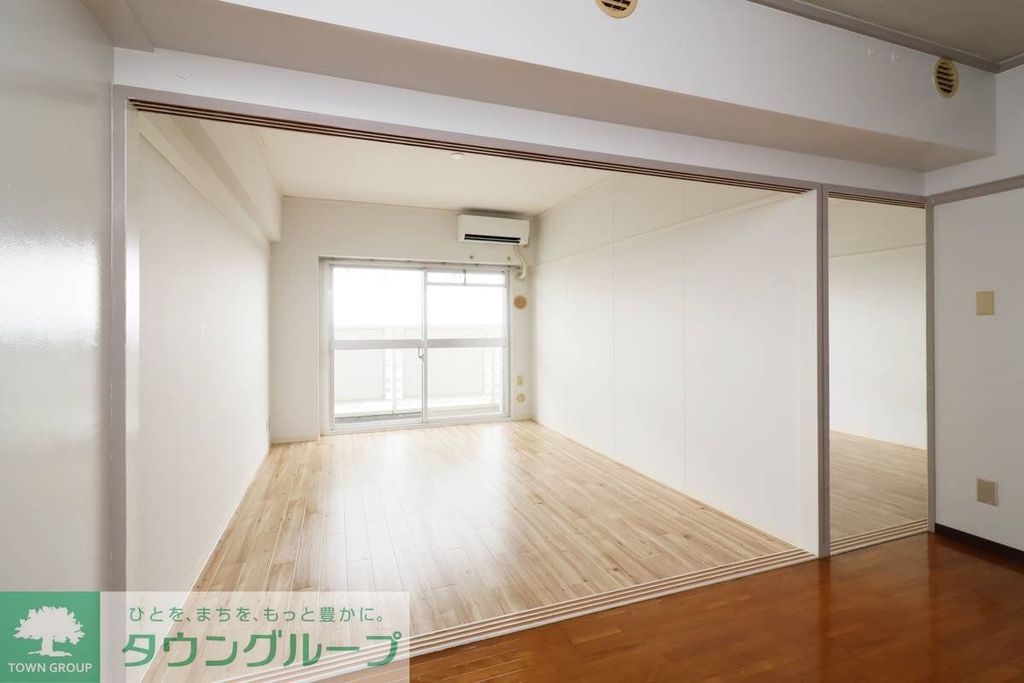 ビレッジハウス成田吾妻タワー1号棟の居間写真
