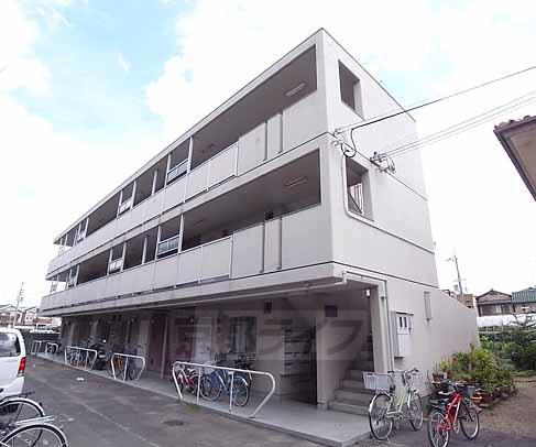 京都市伏見区羽束師古川町のマンションの建物外観