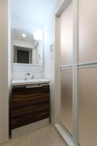 洗面設備　建築中のためモデルルームのお写真になります。