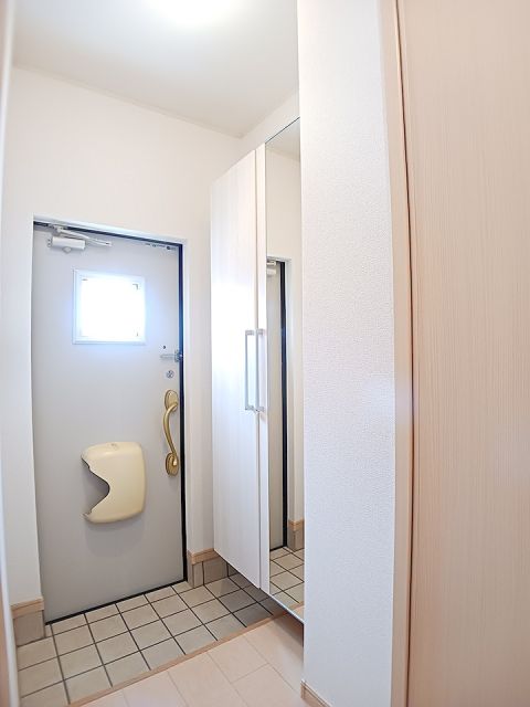 グレイトリバーBの玄関写真