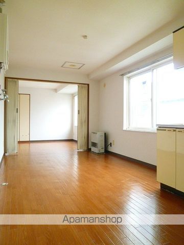 地下鉄東西線 琴似駅 徒歩3分 4階建 築38年の居間写真